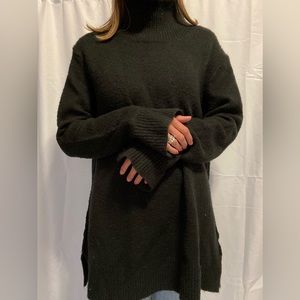 Dark green turtleneck sweater